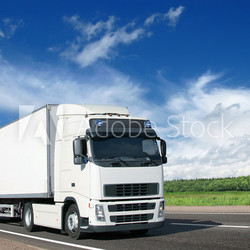 white truck on country highway