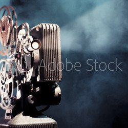 old film projector with dramatic lighting