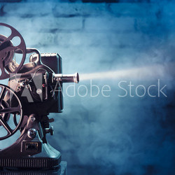 old film projector with dramatic lighting