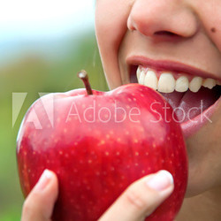 Biting an apple