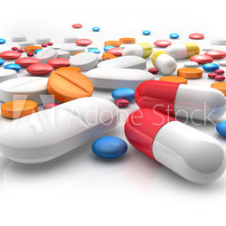 Tabletten auf weißem Untergrund