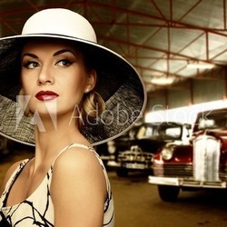 Woman in hat in retro garage