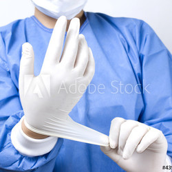 doctor putting gloves
