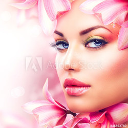 Beautiful Girl With Orchid Flowers. Beauty Woman Face