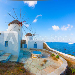 Panoramic view of two windmills and their bases Mykonos Greece C