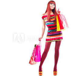 Fashion Shopping Girl. Woman with Shopping Bags over White