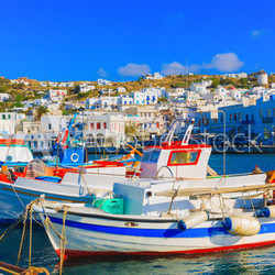 Colorful wooden fishing boats on row  Mykonos island old port Gr
