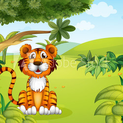 A tiger sitting near the tree