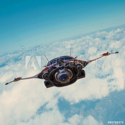 spaceship on blue sky