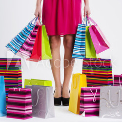 Woman with full shopping bags