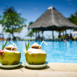 Pina colada drink in front of pool