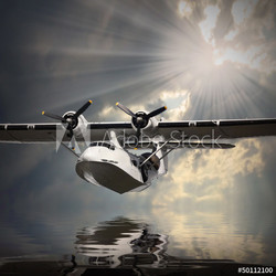 Vintage seaplane flying over a sea level.