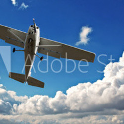 Small light aircraft on training flight