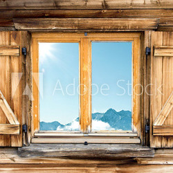 weathered mountain hut window shutter