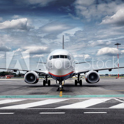 Total View Airplane on Airfield with dramatic Sky