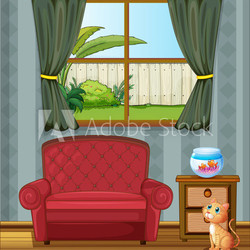 A cat looking at the fish inside the house