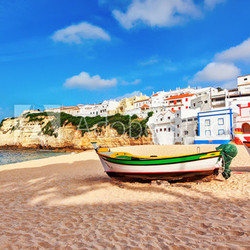Portuguese beach villa in Carvoeiro classic fishing boats. Summe