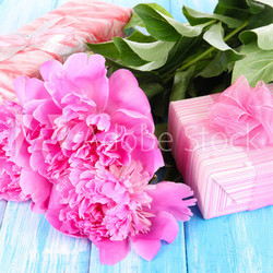 Beautiful peonies on table close-up