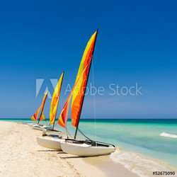 Colorful sailing boats on a cuban beach