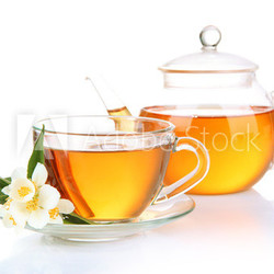 Cup of tea with jasmine, isolated on white