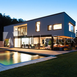 Modern villa with pool, night scene