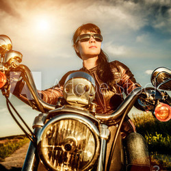Biker girl on a motorcycle