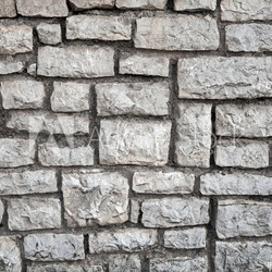 Old gray stone wall background texture