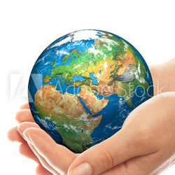 Hand of the person holds globe.