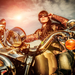 Biker girl on a motorcycle