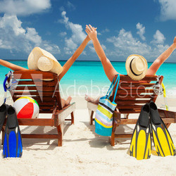 Happy couple on the beach of sea
