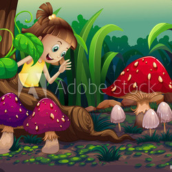 A young girl near the roots of the giant tree