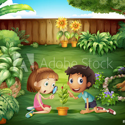 Two adorable kids studying the ladybug at the yard