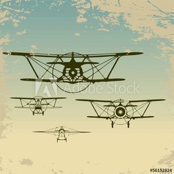 Old planes flying in the clouds,  retro aviation background.