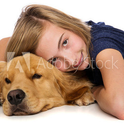 Young girl resting with her dog