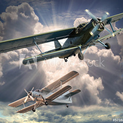 Retro style picture of the biplanes. Transportation theme.