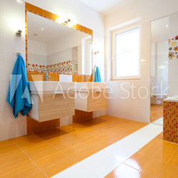 Big white and orange bathroom