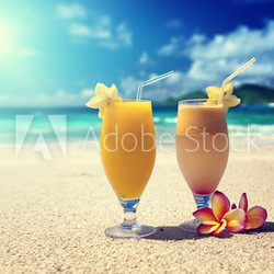 fresh fruit juices on a tropical beach