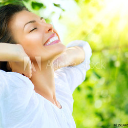 Beautiful Young Woman Outdoor. Enjoy Nature