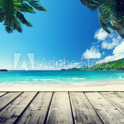 seychelles beach and wooden pier